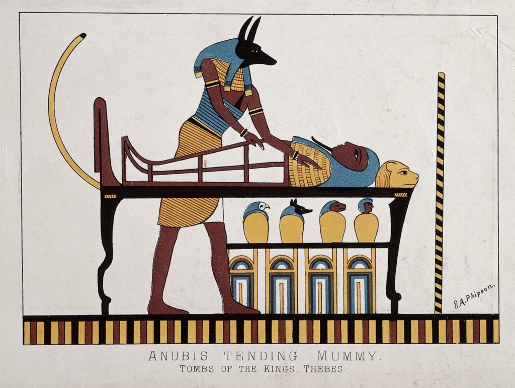 Pictures of Anubis the Egyptian god tending a mummy