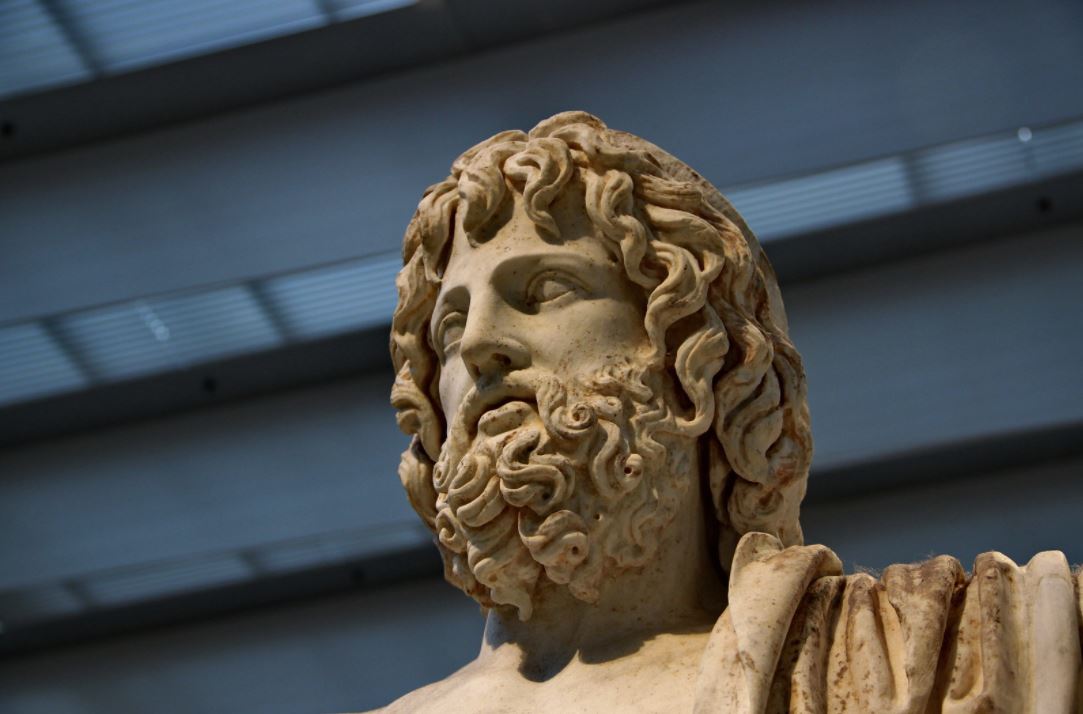 a statue of jupiter the roman god