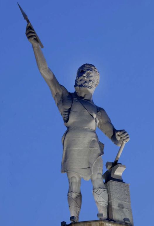 a statue of vulcan the roman god