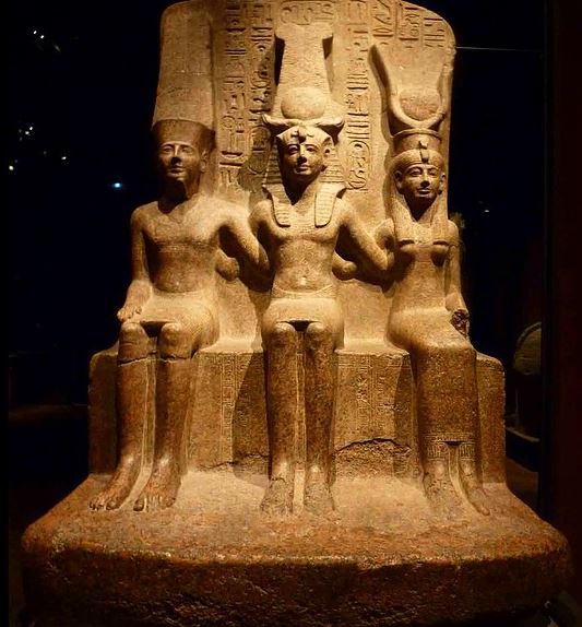 king ramses II with the Egyptian goddess Mut and Amun Ra